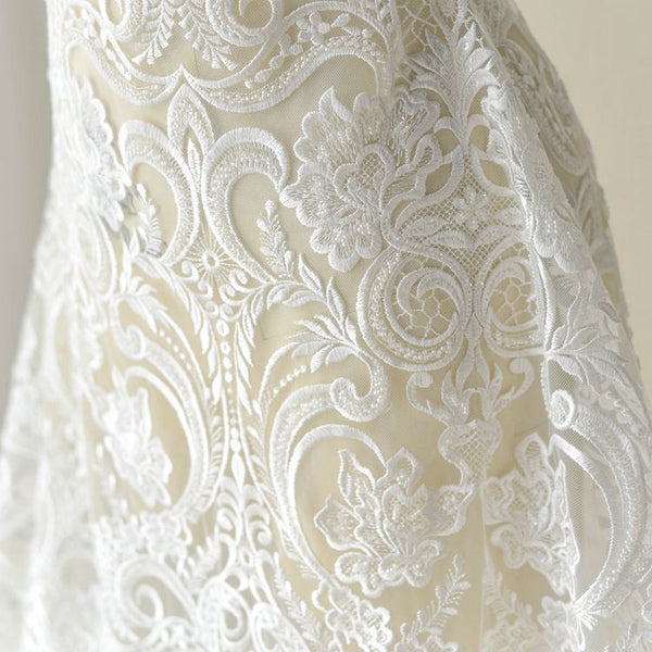 http://www.loveangeldress.com/cdn/shop/products/high-end-embroidery-lace-wedding-accessories-diy-clothing-dress-fabric-2_grande.jpg?v=1625732315