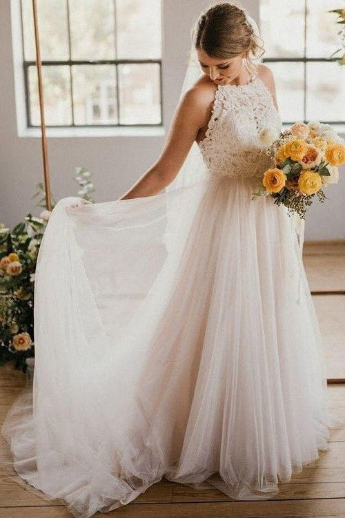 https://www.loveangeldress.com/cdn/shop/products/lace-halter-boho-ivory-wedding-dress-with-tulle-skirt_1024x1024.jpg?v=1578118820